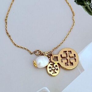 ❌PRICE DROP❌NWT GOLD PLATED TORI BURCH,PEARL/CUT OUT LOGO TB BRACELET